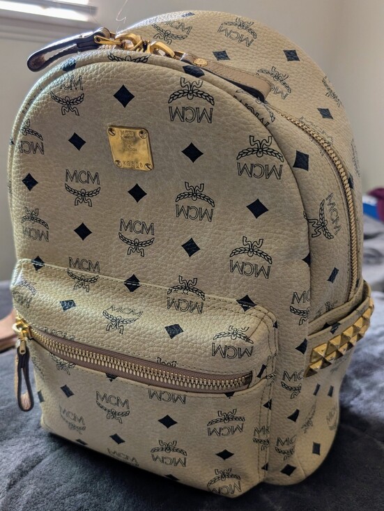 MCM Handbags - MCM Beige Visetos Side Studs Stark Medium Backpack with Black Logo Print